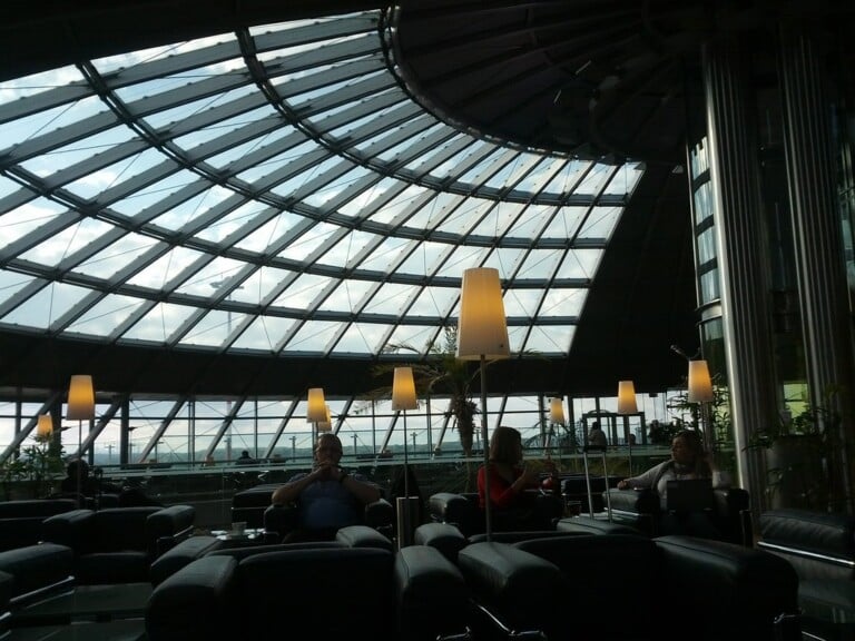 Airport departure lounge with seating for travelers
